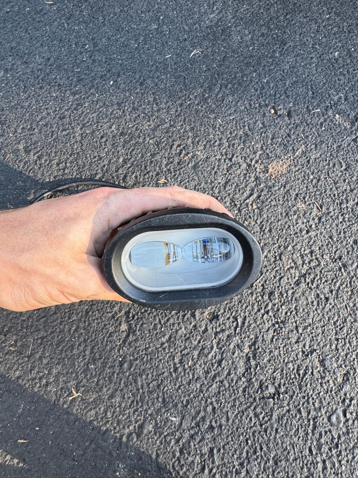 Stock Round Headlight with Red Bracket, photo 1 of 3